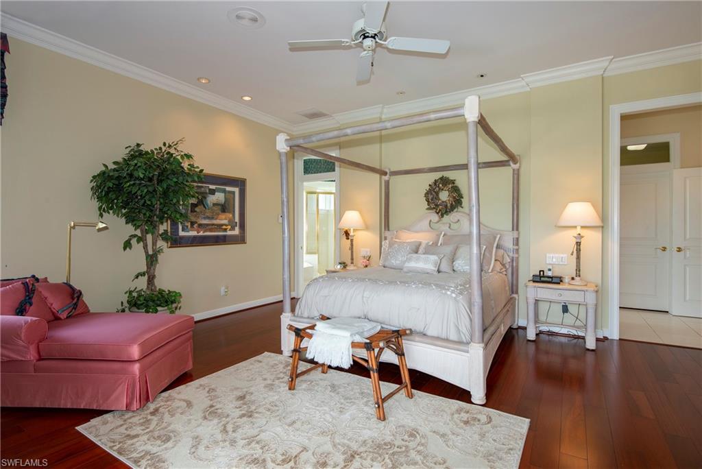 20128 Cheetah Lane Estero, FL 33928 - Photo 7 of 30 a bedroom with furniture and a wooden floor