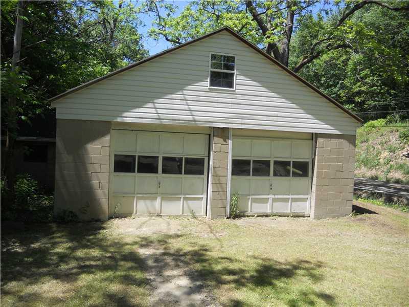 101 A Engle Road Industry, PA 15052 - Photo 22 of 22 Parking Lot/Garage. Additional detached garage used for storage but could be heated for hobbyist use