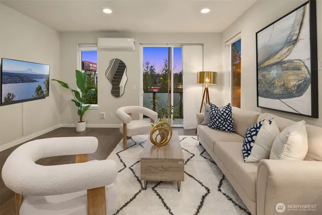 a living room with furniture and a clock