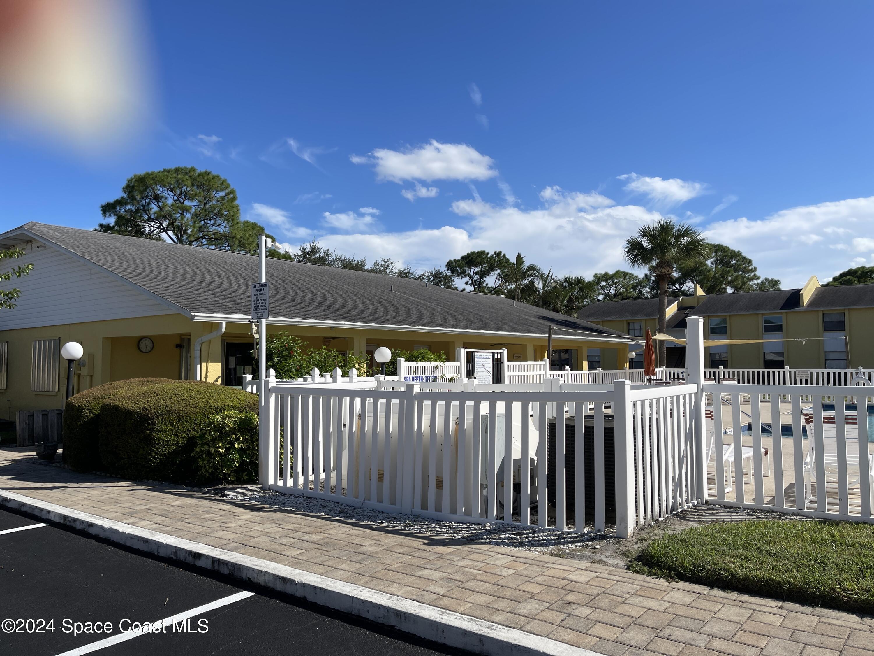 598 North Wickham Road, Unit 36 Melbourne, FL 32935 - Photo 20 of 21 POOL HOUSE