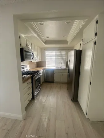 a view of a hallway with entryway