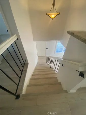 a view of a kitchen with a sink