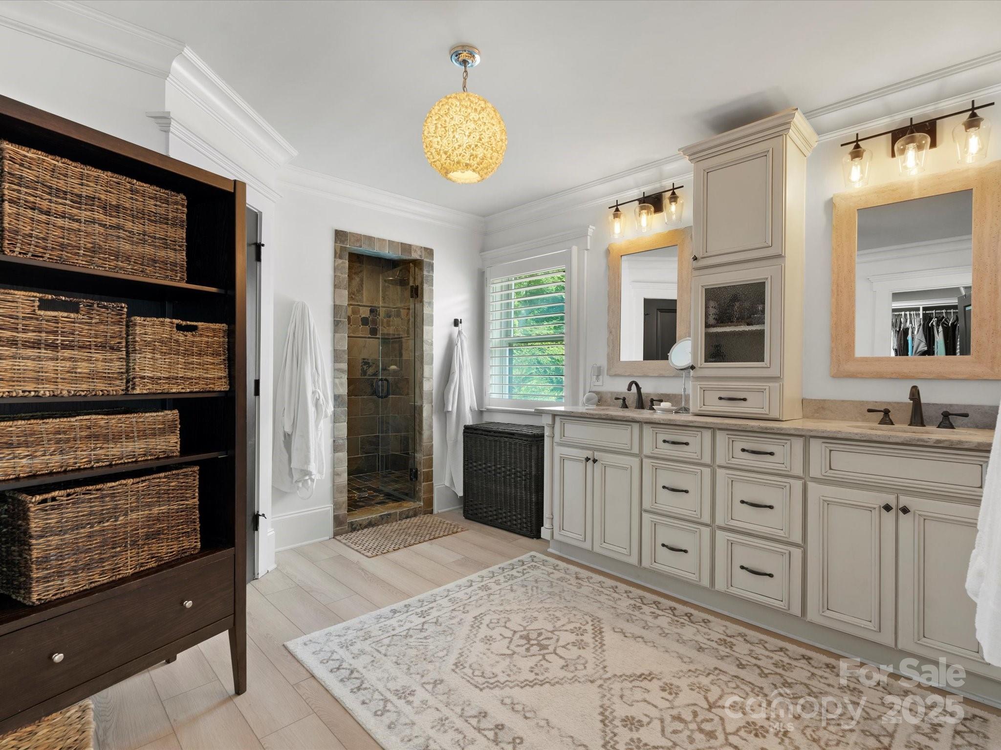 315 Mountainview Drive Charlotte, NC 28270 - Photo 11 of 34 a spacious bathroom with a granite countertop sink and a mirror