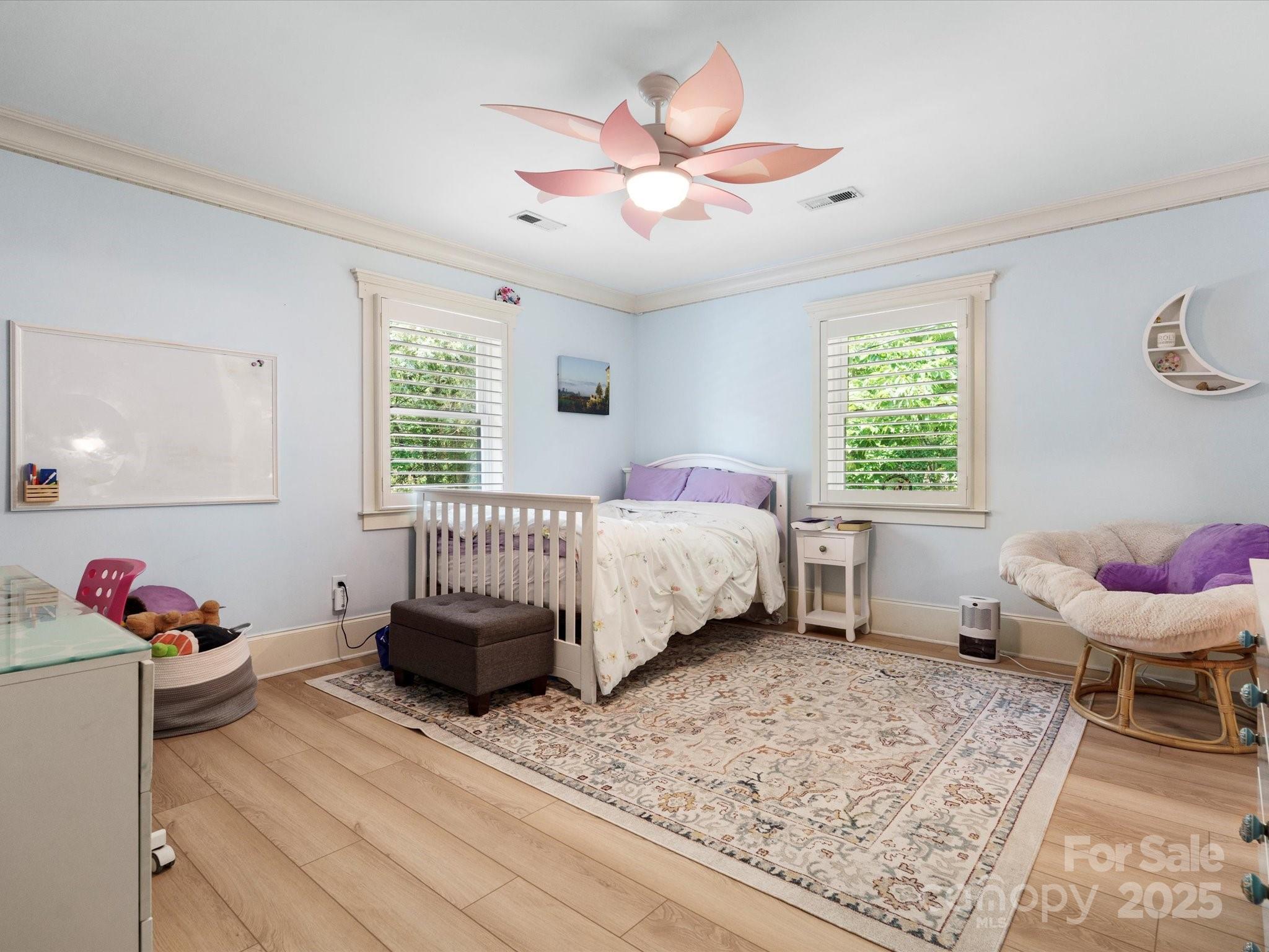 315 Mountainview Drive Charlotte, NC 28270 - Photo 12 of 34 a bedroom with a bed and a window