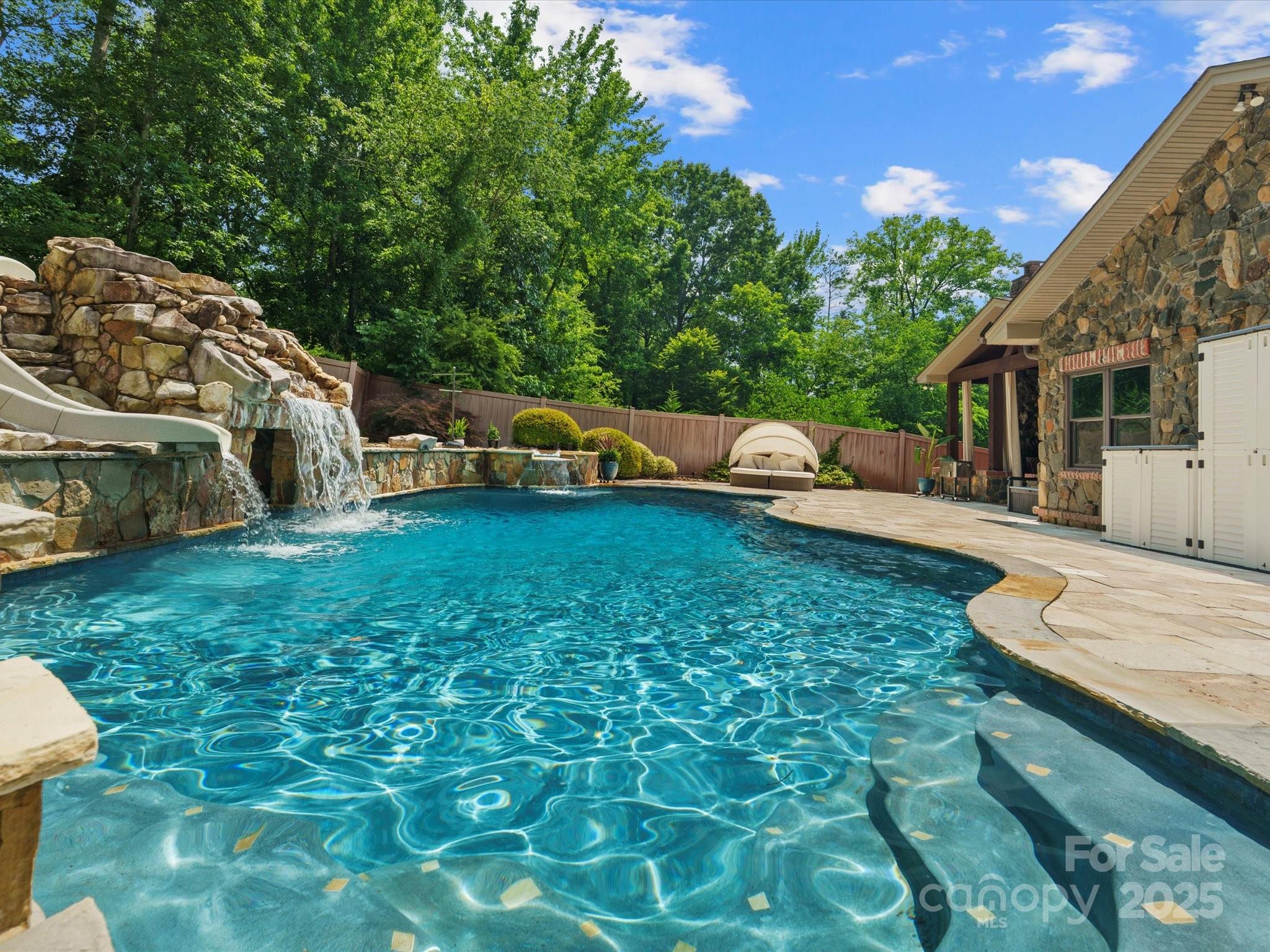 315 Mountainview Drive Charlotte, NC 28270 - Photo 16 of 34 a view of a house with backyard and sitting area