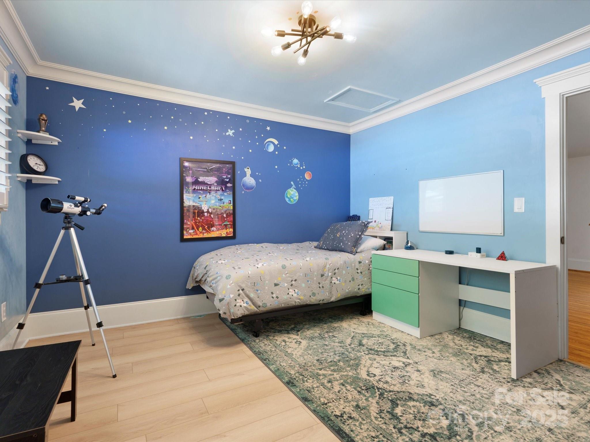 315 Mountainview Drive Charlotte, NC 28270 - Photo 24 of 34 a bedroom with a bed and a desk