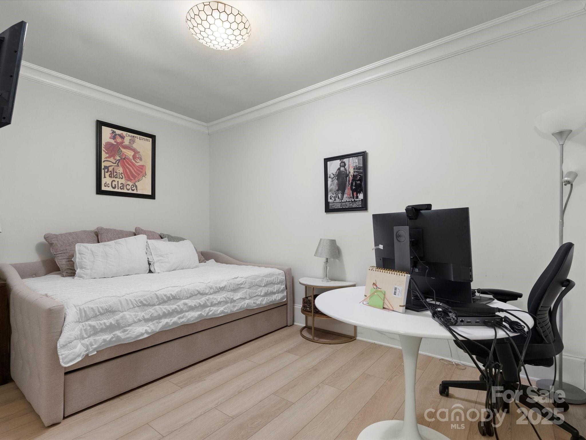 315 Mountainview Drive Charlotte, NC 28270 - Photo 28 of 34 a bed room with a bed and a desk