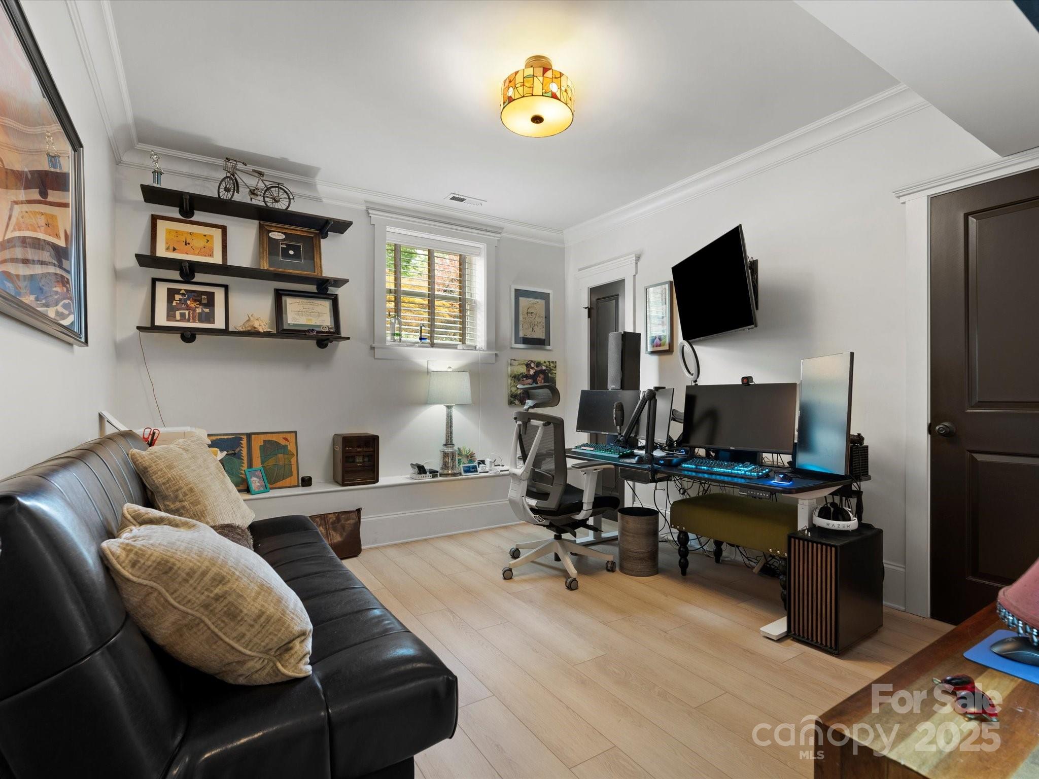 315 Mountainview Drive Charlotte, NC 28270 - Photo 30 of 34 a living room with furniture and a flat screen tv