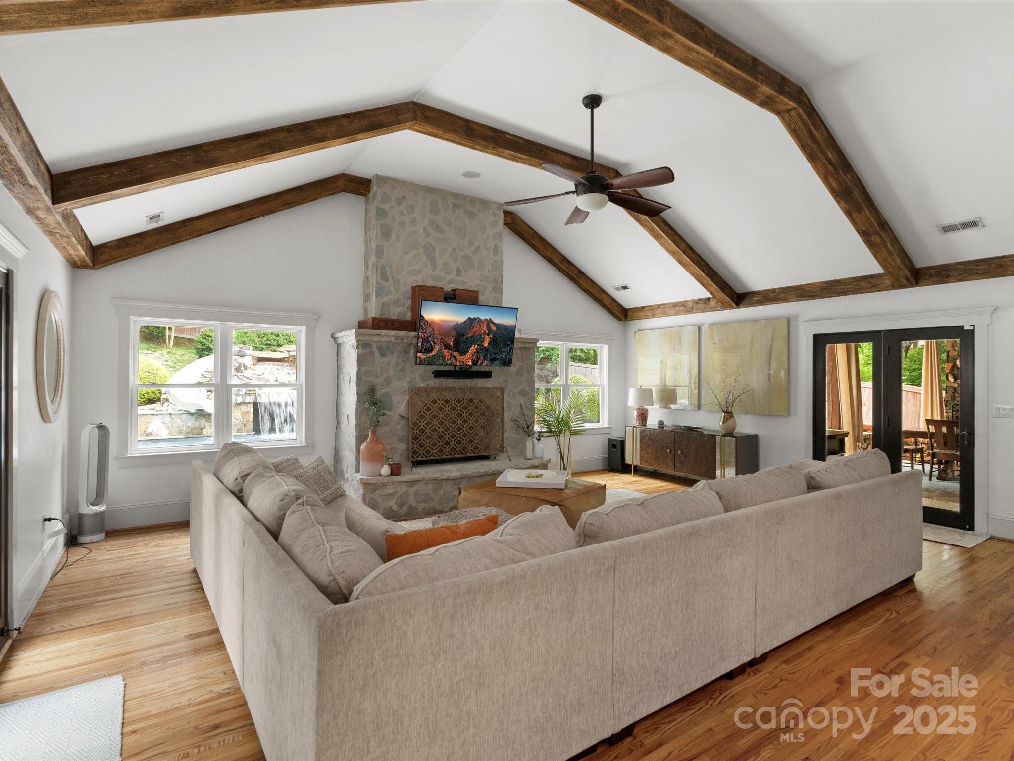 315 Mountainview Drive Charlotte, NC 28270 - Photo 3 of 34 a living room with furniture and a fireplace