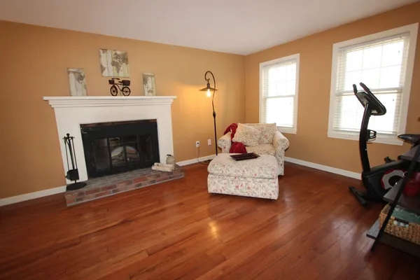 a bathroom with a sink toilet and mirror