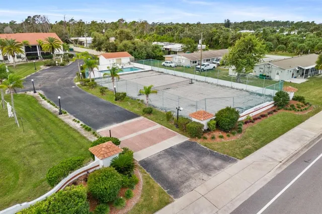 an aerial view of a house with a garden