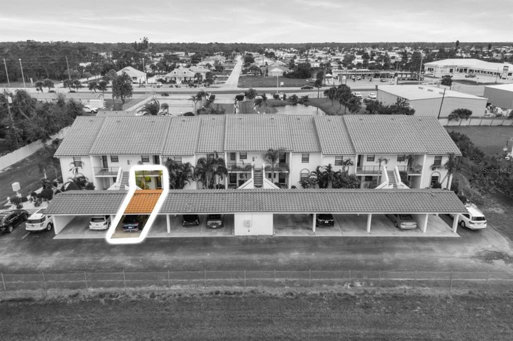 2275 South McCall Road, Unit 102 Englewood, FL 34224 - Photo 28 of 48 an aerial view of a house