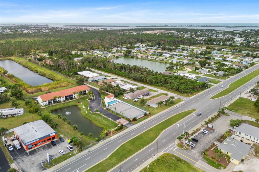 2275 South McCall Road, Unit 102 Englewood, FL 34224 - Photo 30 of 48 an aerial view of a city