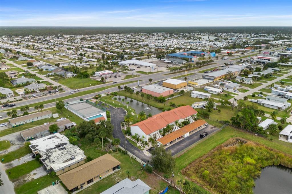 2275 South McCall Road, Unit 102 Englewood, FL 34224 - Photo 35 of 48 an aerial view of multiple house
