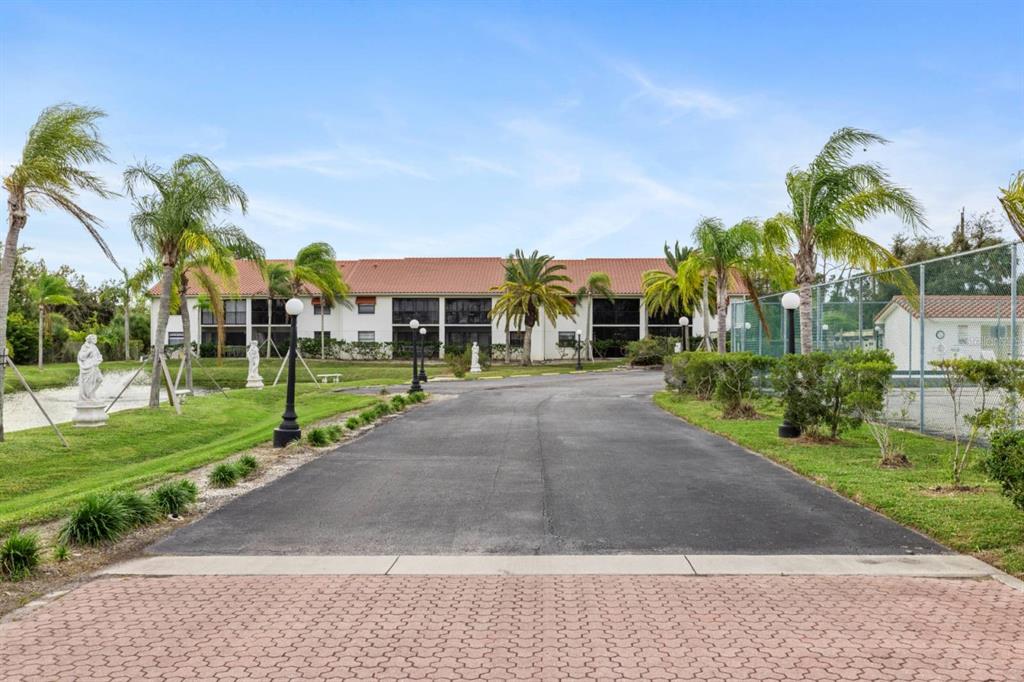 2275 South McCall Road, Unit 102 Englewood, FL 34224 - Photo 6 of 48 a view of a volley ball court