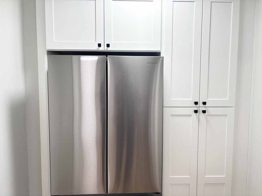 73 Dent Street, Unit 1 Boston, MA 02132 - Photo 13 of 36 a view of a closet