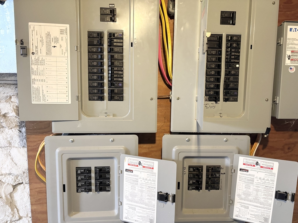 73 Dent Street, Unit 1 Boston, MA 02132 - Photo 33 of 36 a utility room with dryer and washer