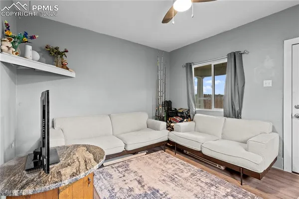 a living room with furniture and a couch