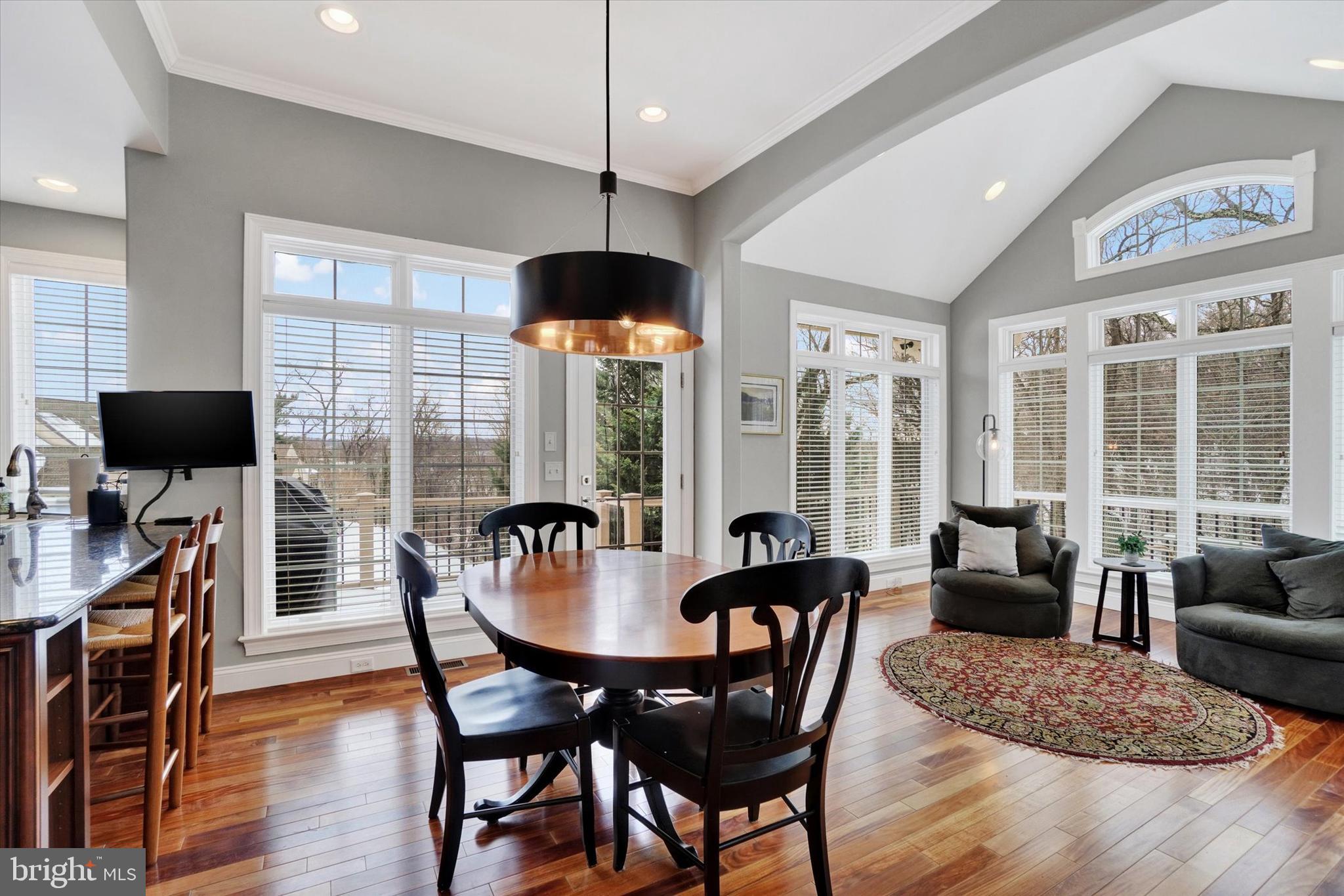 130 Valmere Path York, PA 17403 - Photo 11 of 56 a view of a dining room with furniture window and wooden floor