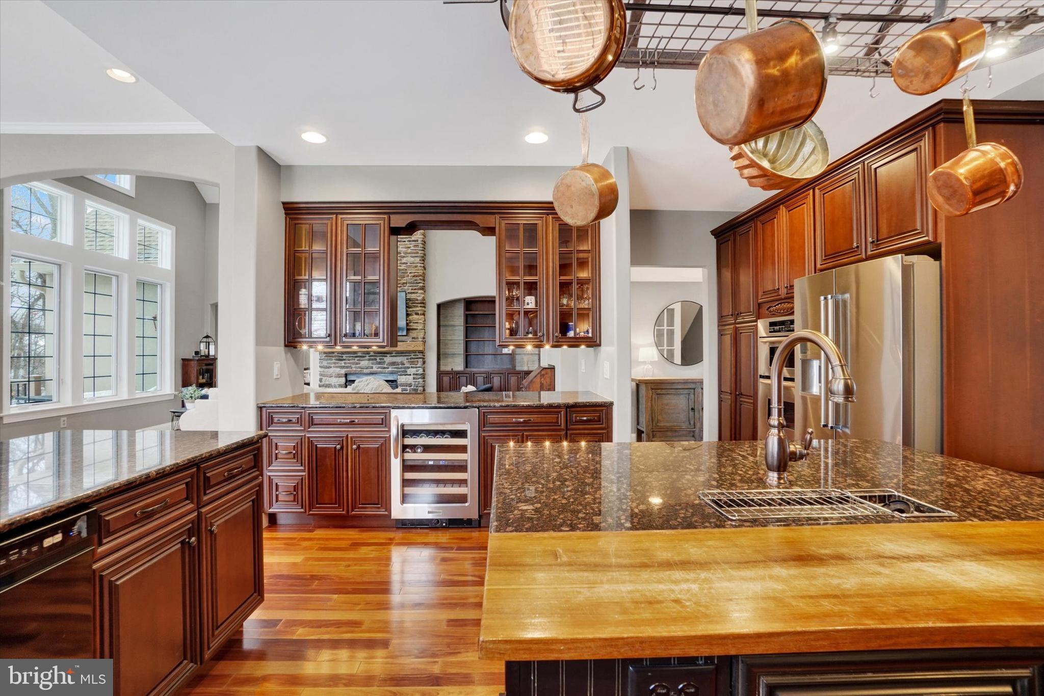130 Valmere Path York, PA 17403 - Photo 16 of 56 a view of living room kitchen with stove and cabinets