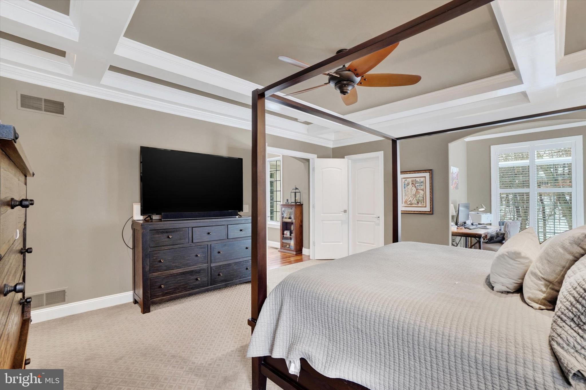 130 Valmere Path York, PA 17403 - Photo 24 of 56 a bedroom with a bed and a flat tv screen on dresser