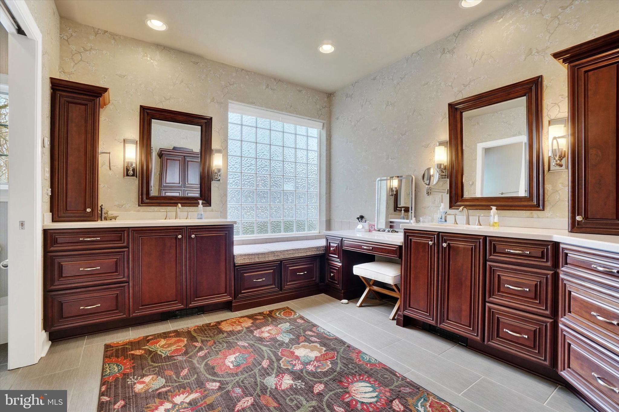 130 Valmere Path York, PA 17403 - Photo 26 of 56 a spacious bathroom with a granite countertop sink mirror and bathtub