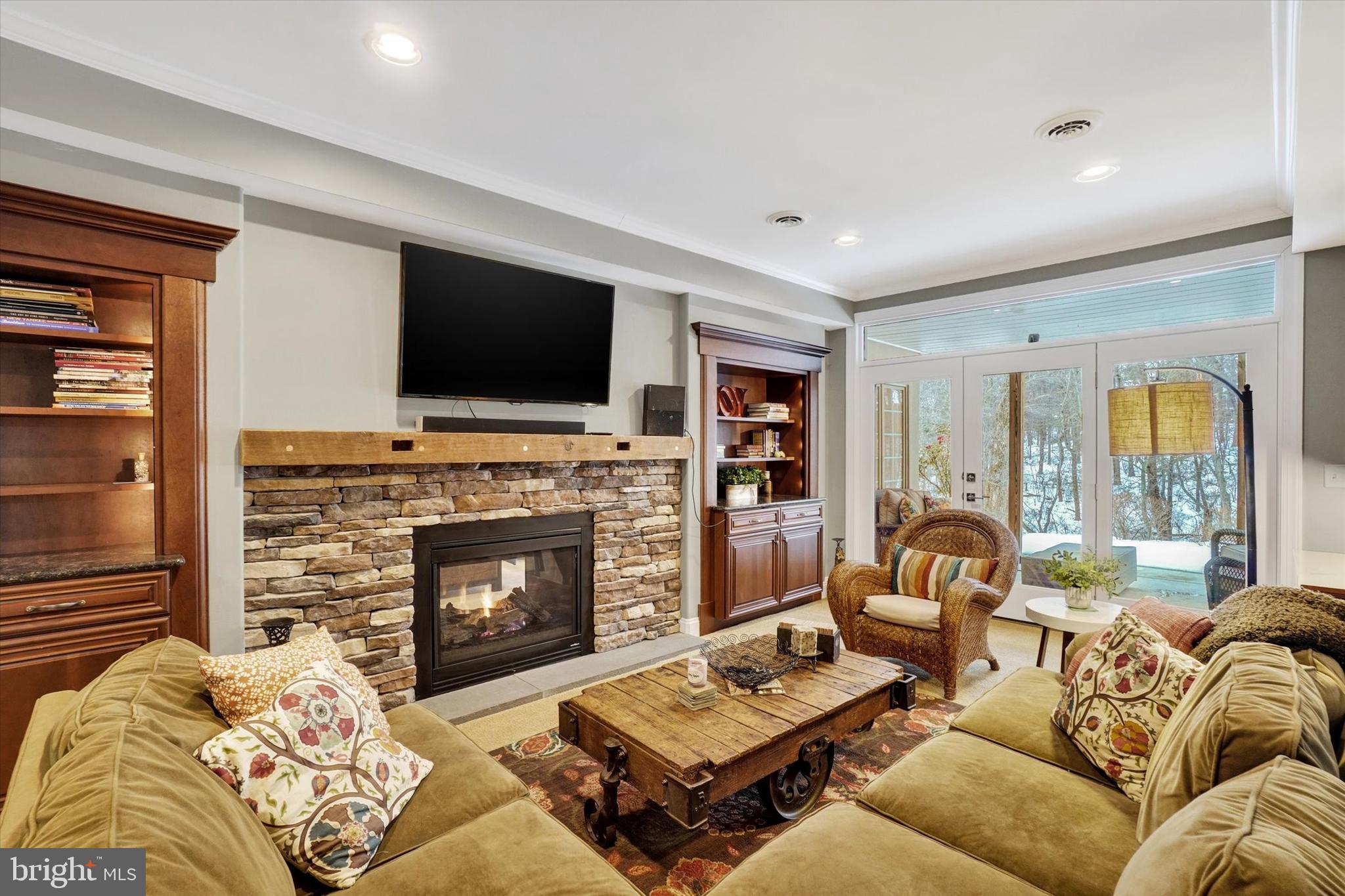 130 Valmere Path York, PA 17403 - Photo 36 of 56 a living room with furniture flat screen tv and a fireplace