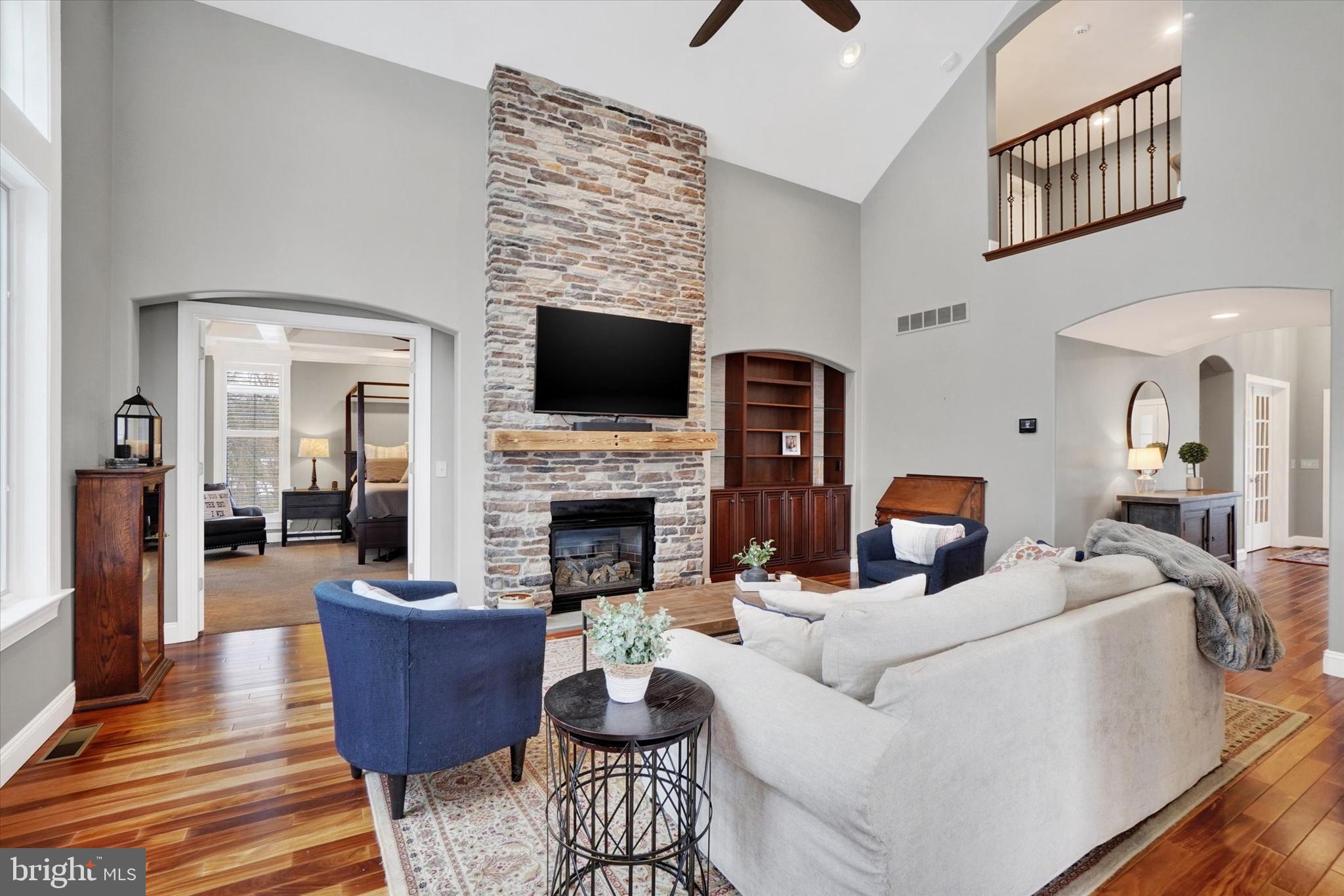 130 Valmere Path York, PA 17403 - Photo 9 of 56 a living room with furniture a fireplace and a flat screen tv
