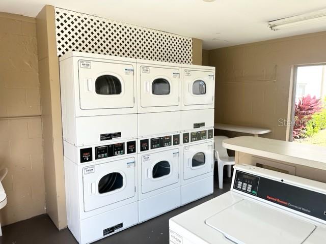 7701 Starkey Road, Unit 731 Seminole, FL 33777 - Photo 12 of 19 a utility room with dryer and washer