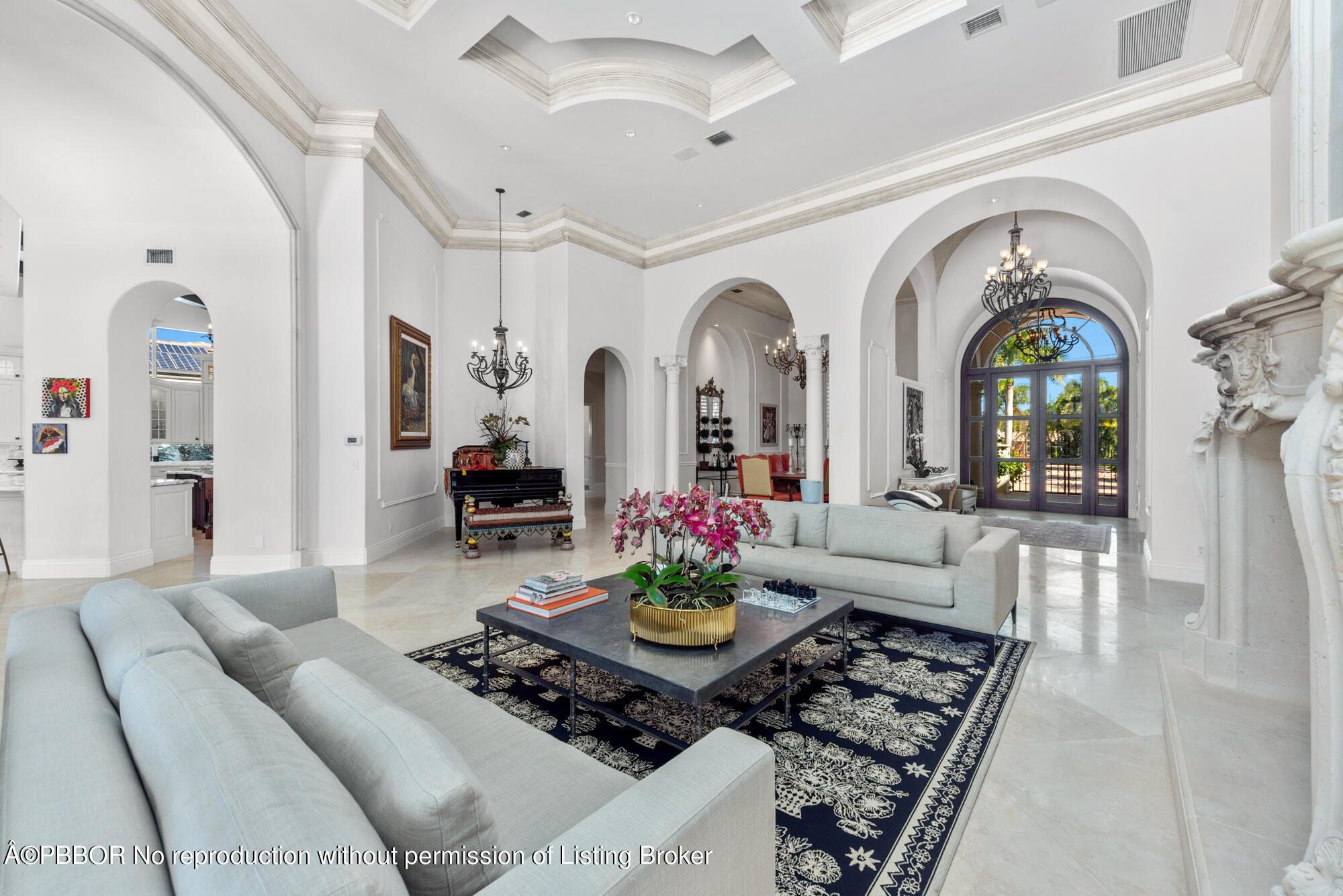314 West Riverside Drive Jupiter, FL 33469 - Photo 11 of 92 a living room with furniture and a chandelier