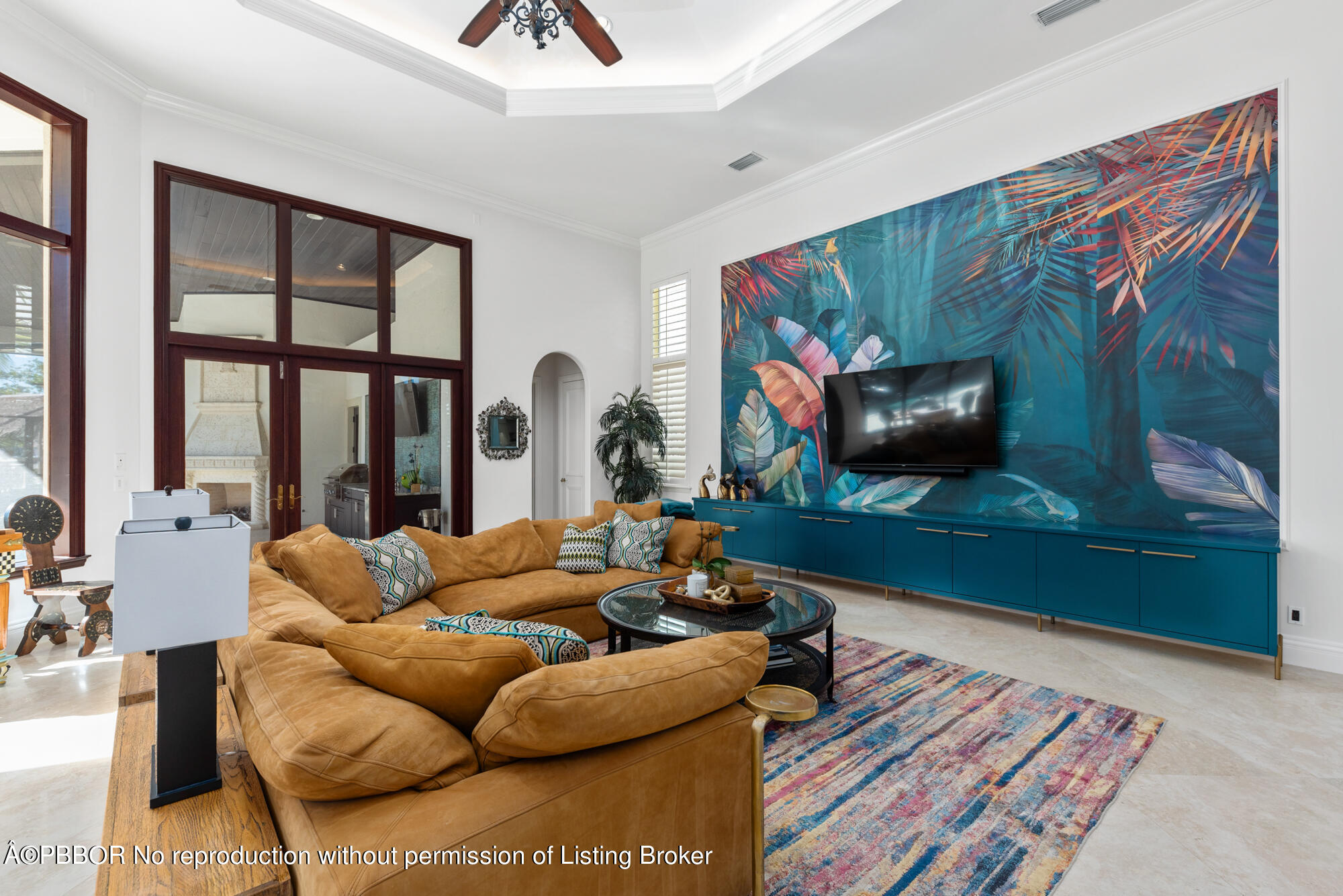 314 West Riverside Drive Jupiter, FL 33469 - Photo 22 of 92 a living room with furniture and a flat screen tv