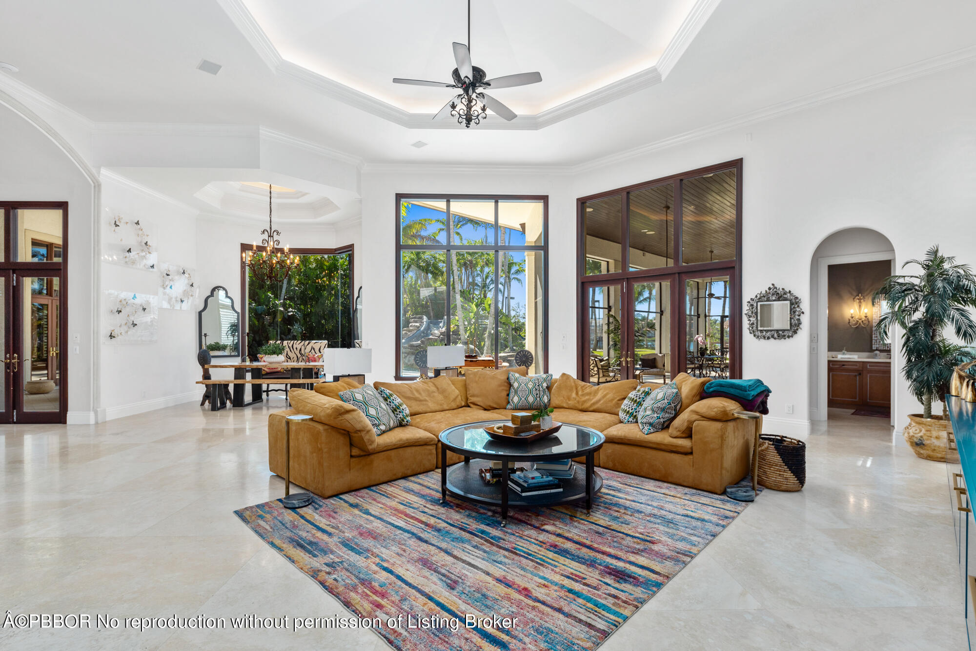 314 West Riverside Drive Jupiter, FL 33469 - Photo 23 of 92 a living room with furniture ceiling fan and a rug