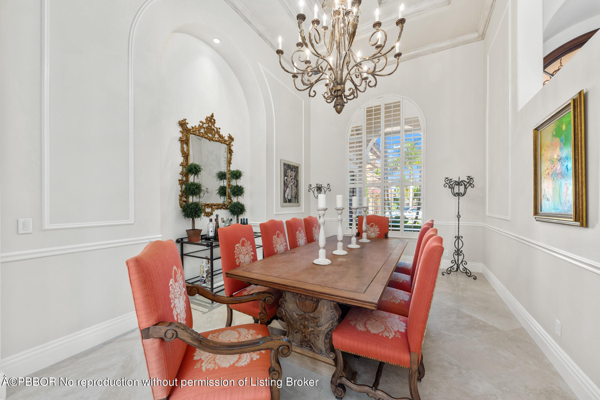 314 West Riverside Drive Jupiter, FL 33469 - Photo 24 of 92 a view of a dining room with furniture and chandelier