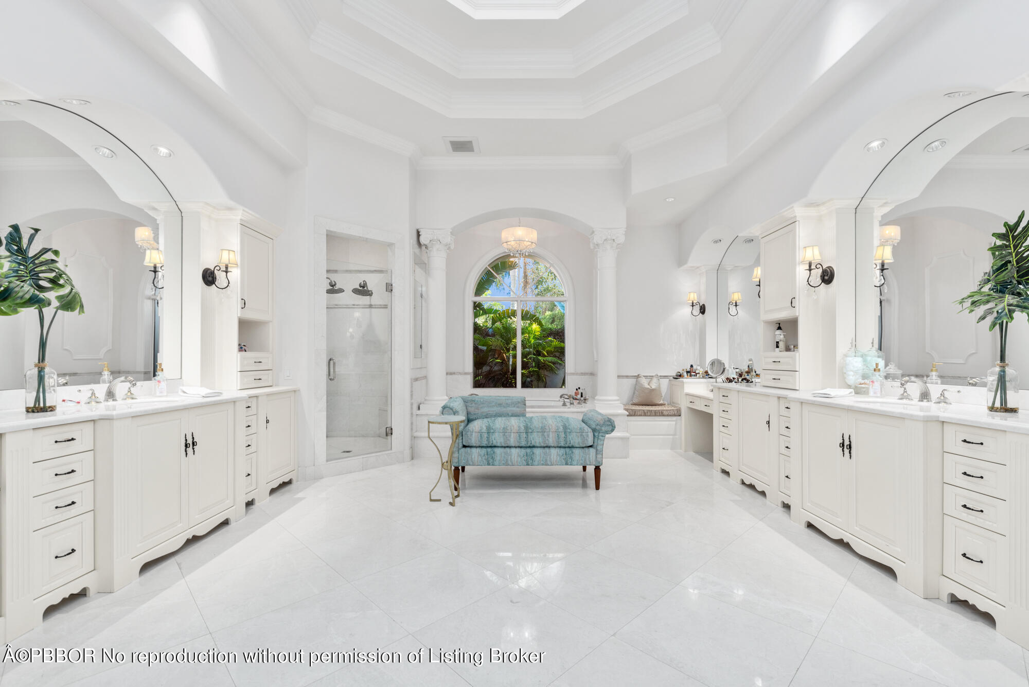 314 West Riverside Drive Jupiter, FL 33469 - Photo 31 of 92 a spacious en suite bathroom with a double vanity sink a large mirror a bathtub and next to a window