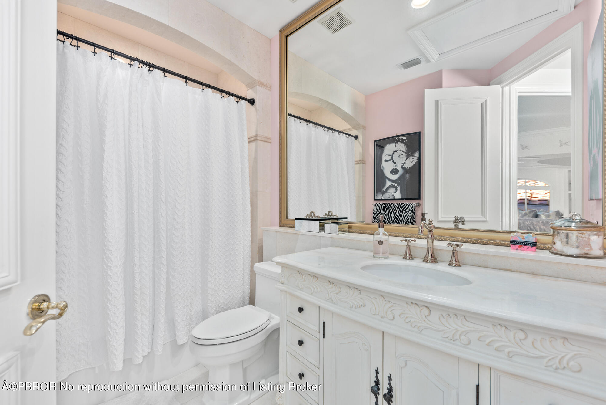 314 West Riverside Drive Jupiter, FL 33469 - Photo 63 of 92 a bathroom with a granite countertop sink toilet and a mirror