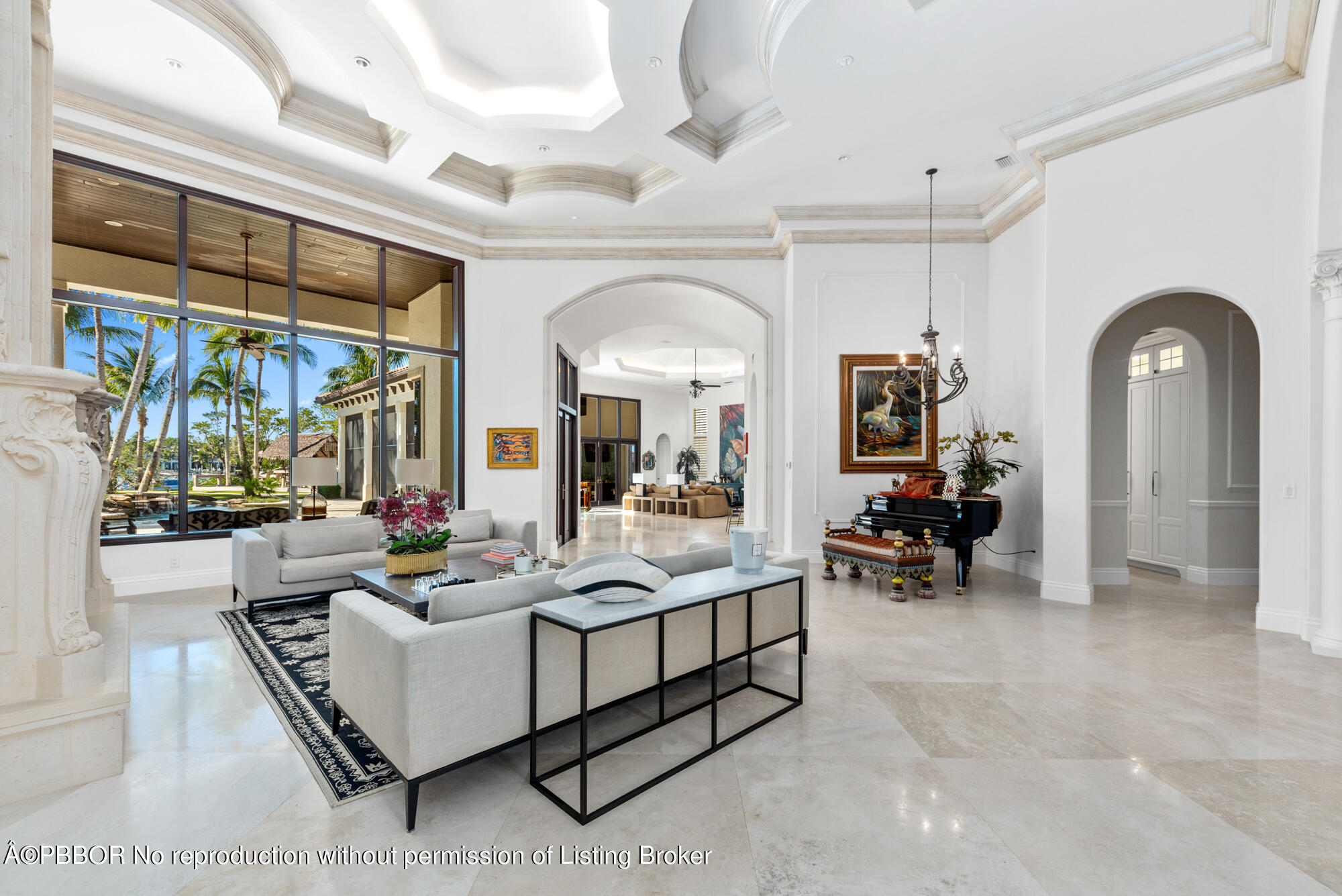 314 West Riverside Drive Jupiter, FL 33469 - Photo 7 of 92 a living room with patio furniture and a large window