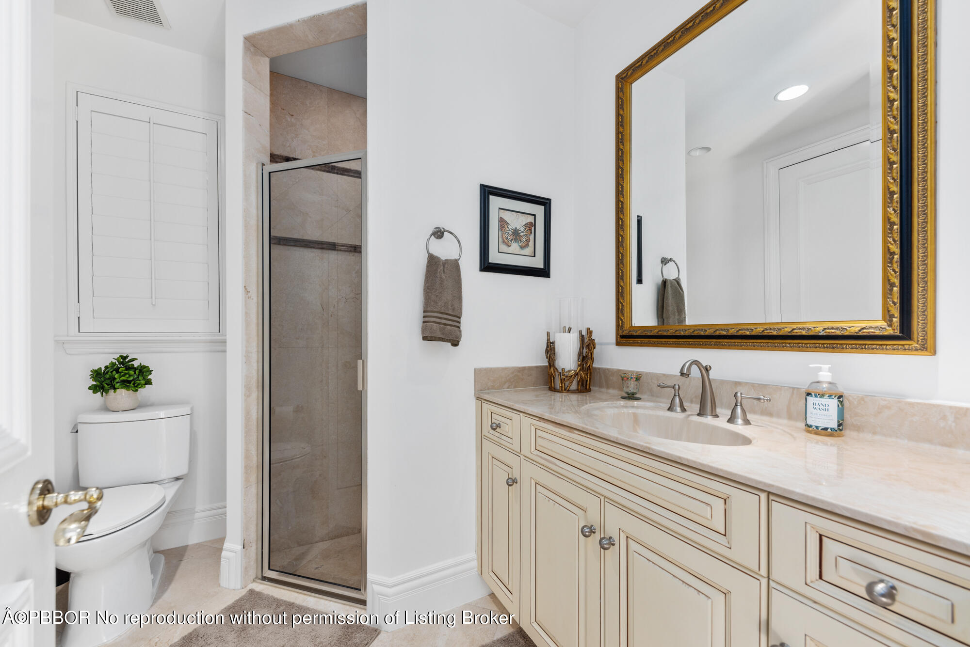 314 West Riverside Drive Jupiter, FL 33469 - Photo 80 of 92 a bathroom with a sink and a mirror