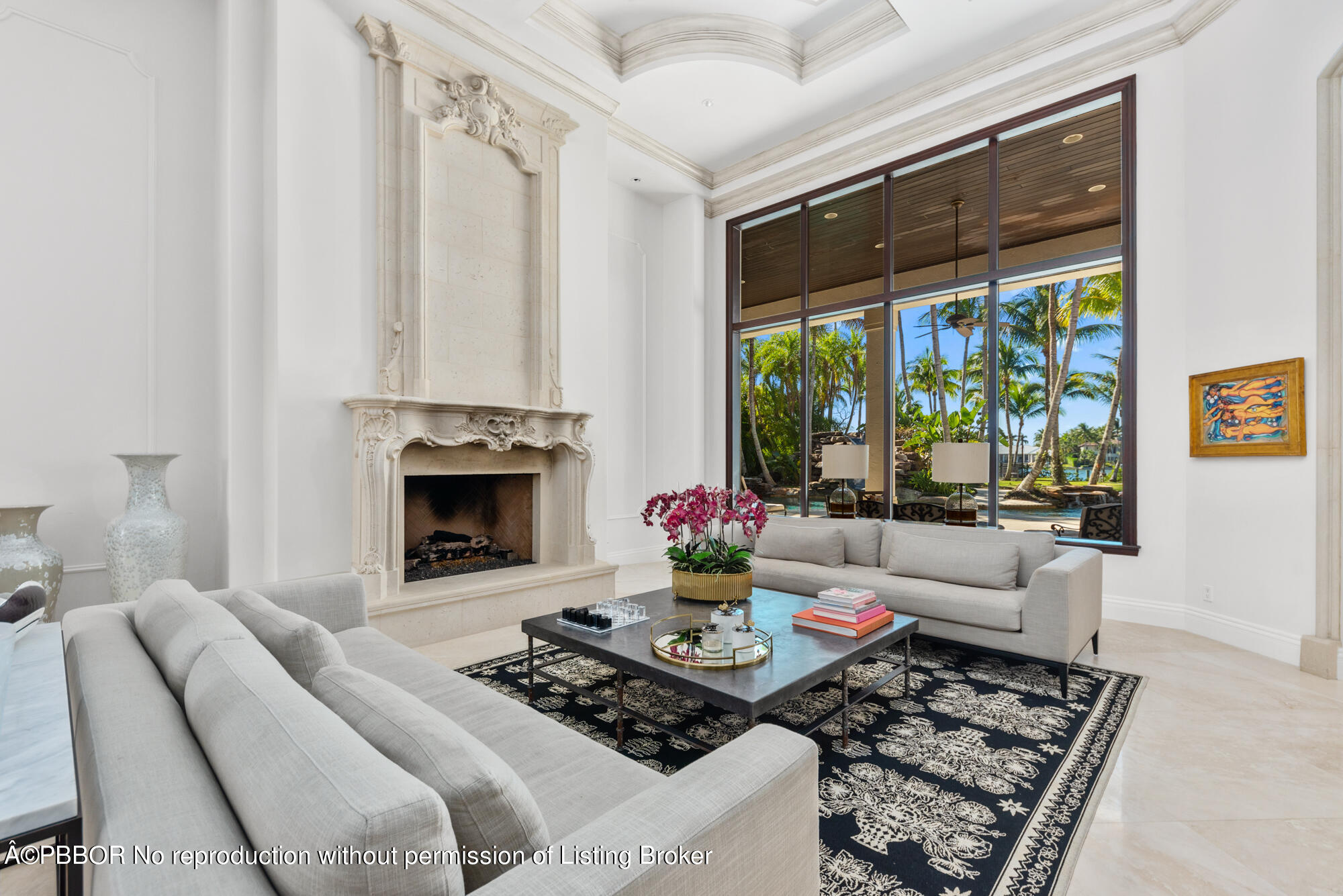 314 West Riverside Drive Jupiter, FL 33469 - Photo 8 of 92 a living room with furniture and a fireplace