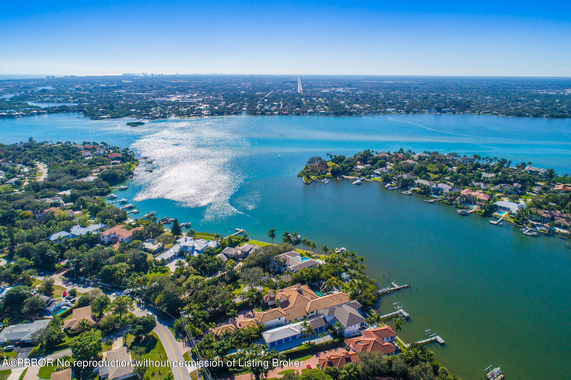 314 West Riverside Drive Jupiter, FL 33469 - Photo 91 of 92 a view of a lake with a mountain in the background