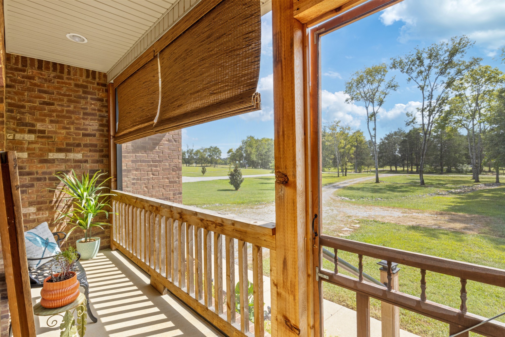 a view of a porch with a yard