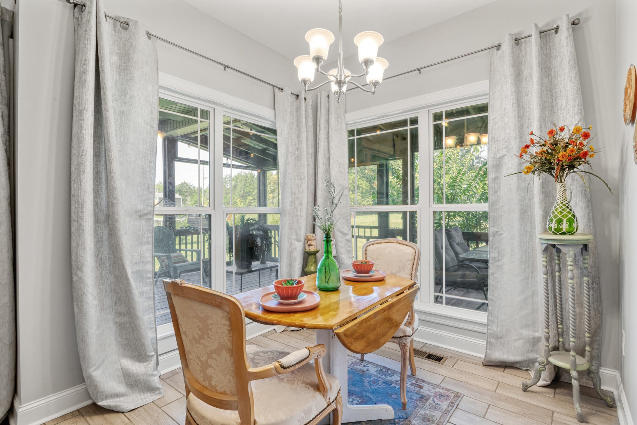 2264 Blackwell Road Chapel Hill, TN 37034 - Photo 7 of 18 a dining room with furniture potted plants and wooden floor