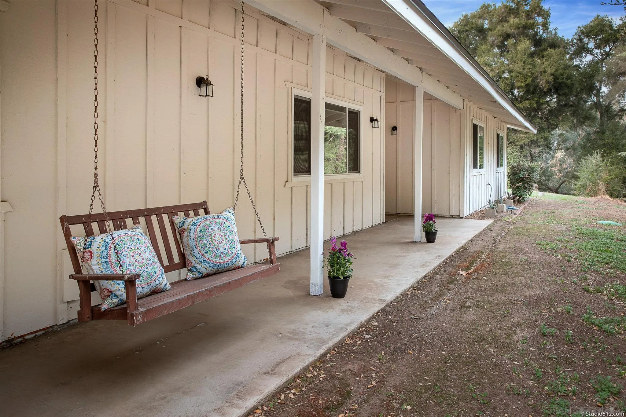 11425 Betsworth Road Valley Center, CA 92082 - Photo 5 of 24 a view of a house with backyard and sitting area