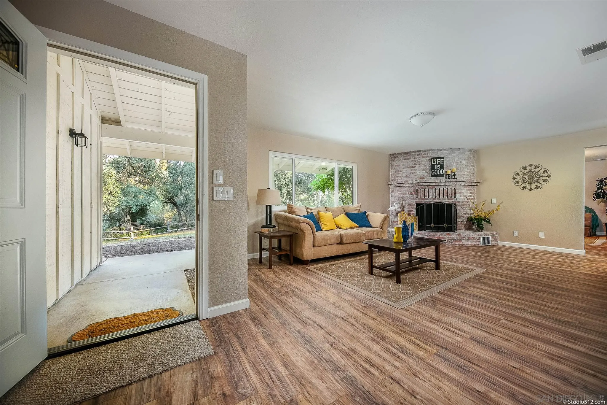 11425 Betsworth Road Valley Center, CA 92082 - Photo 6 of 24 a living room with furniture and a window