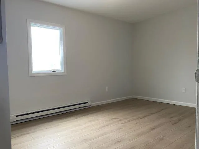 an empty room with a window