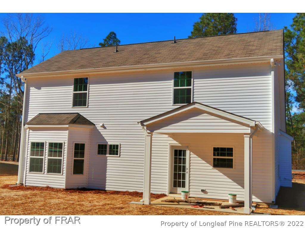865 Montrose Road Raeford, NC 28376 - Photo 8 of 21 a view of a house with a yard
