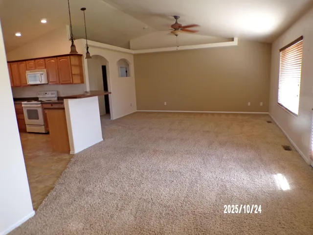 a view of a kitchen with a sink