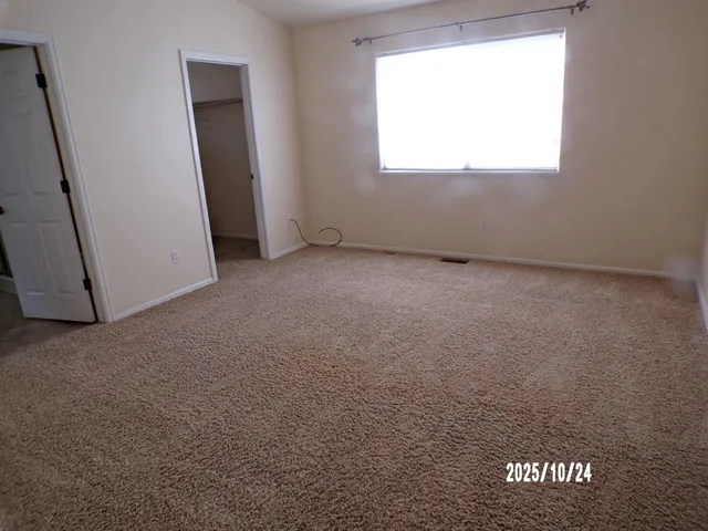 an empty room with window