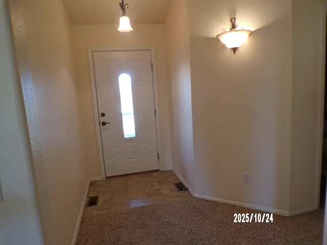 an empty room with a bathroom