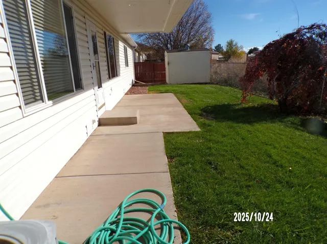 a backyard of a house with lots of green space