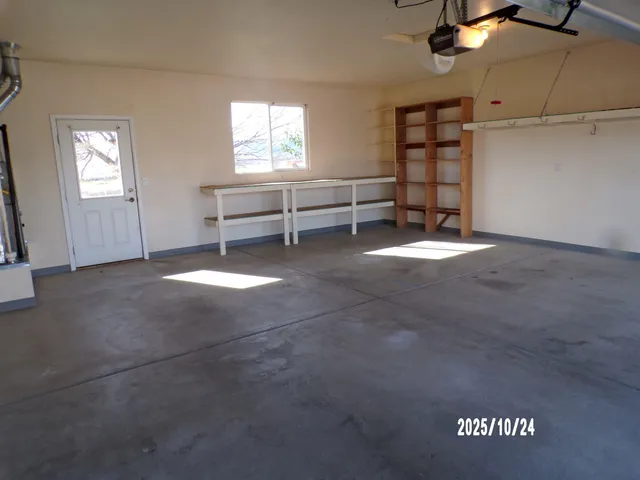 a view of empty room with windows